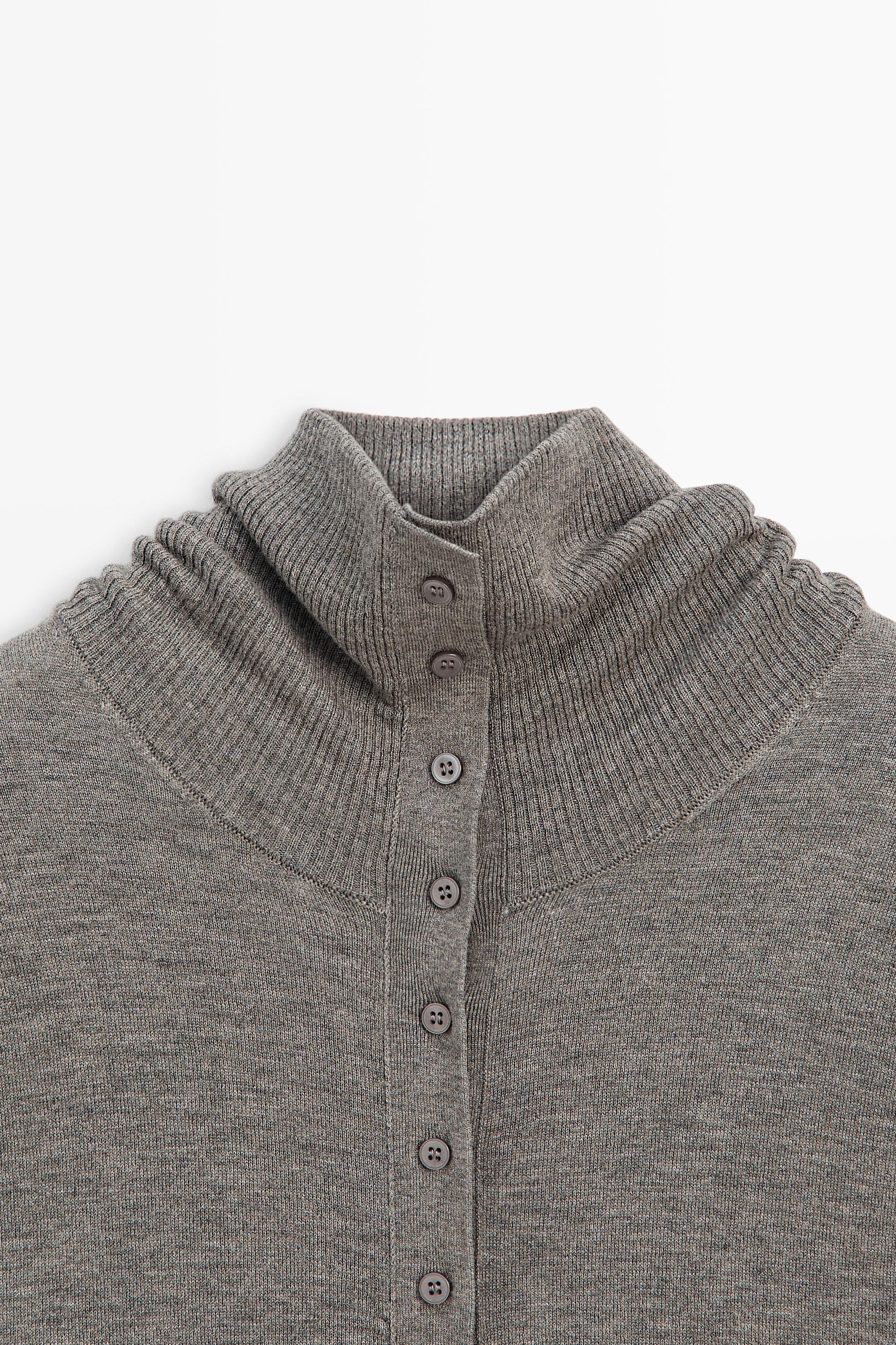 Turtleneck cardigan with button detail
